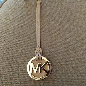 NWOT Michael Kors hangtag. Firm price $11 each .  No bundle discounts